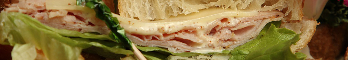 Eating Sandwich at The Bagel Meister restaurant in Douglasville, GA.